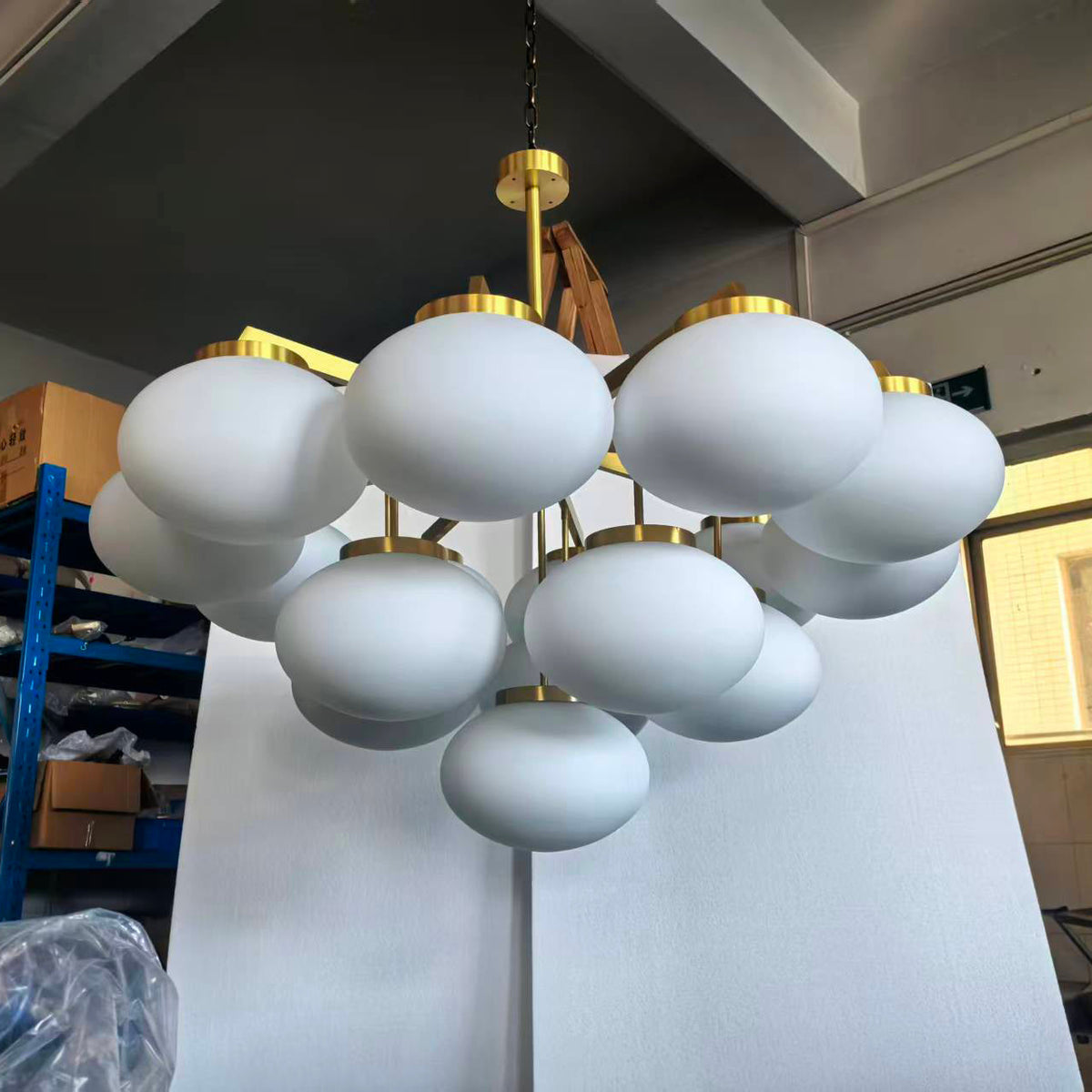 Cloudesley Chandelier – Machined Brass & Tiered White Glass Chandelier