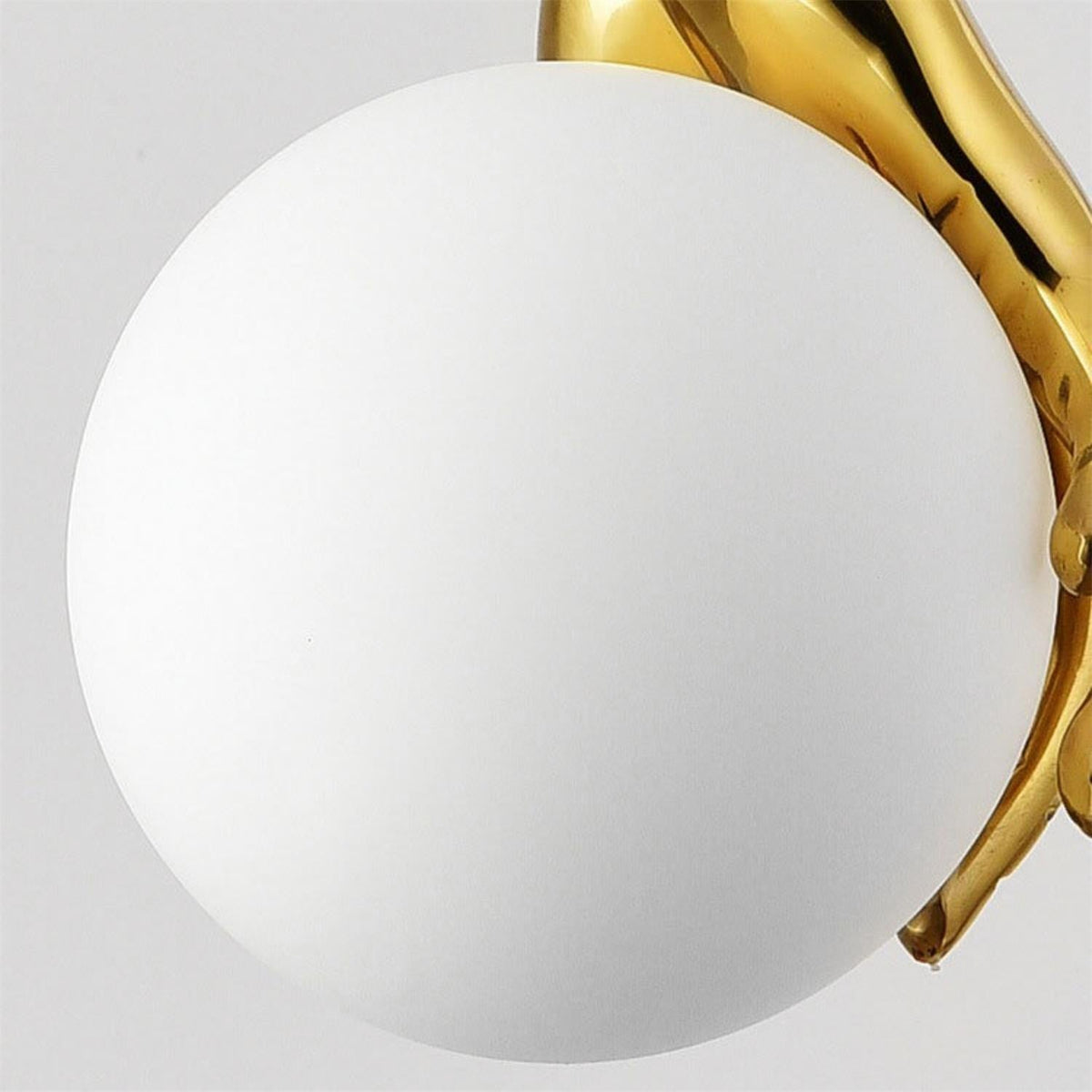 Hand Holding Globe Pendant Light - Sculptural Brass Hand & White Glass Orb Pendant