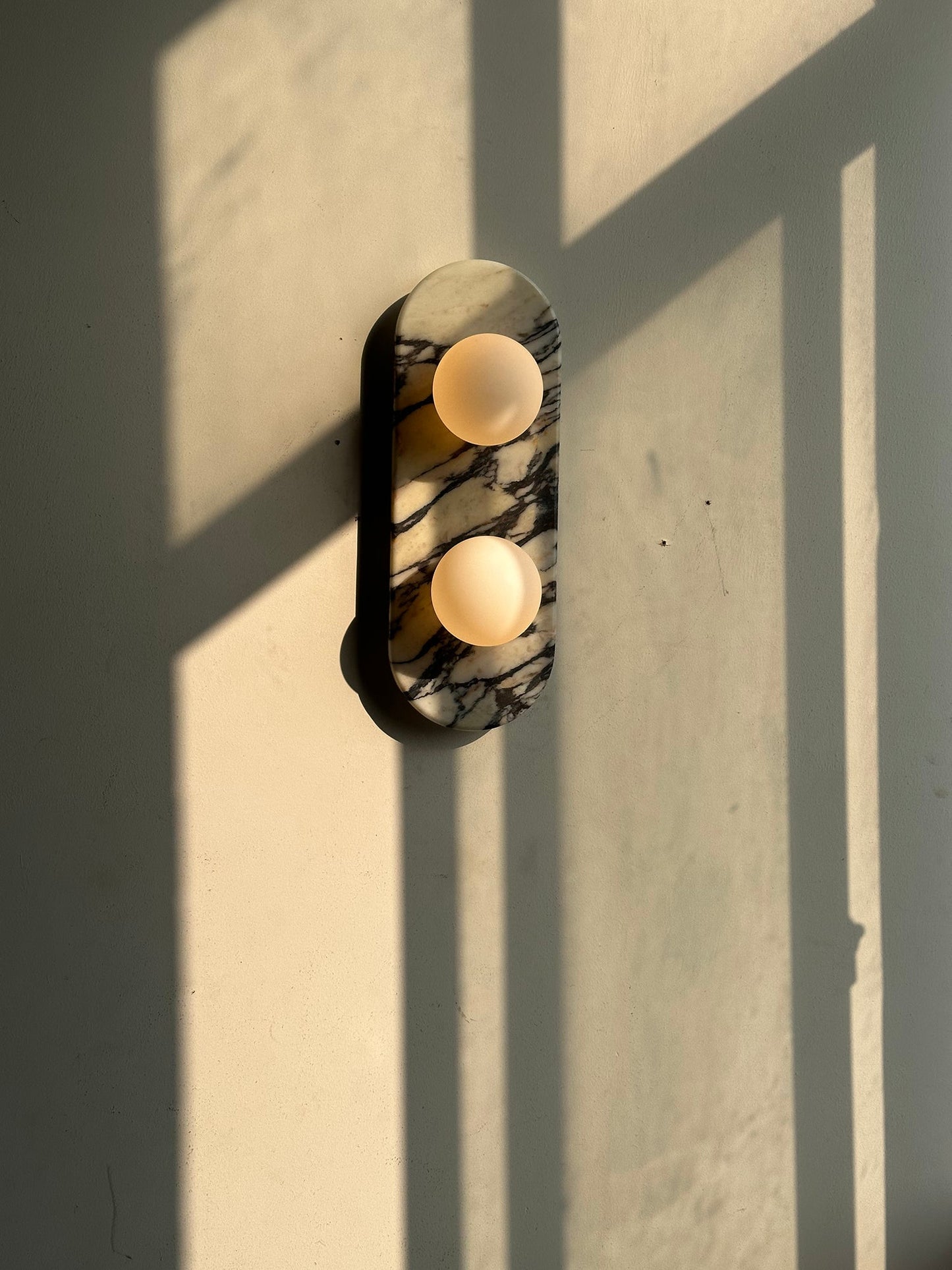 Asteria Wall Lamp | Luxury Double-Ended Marble & Glass Globe Sconce