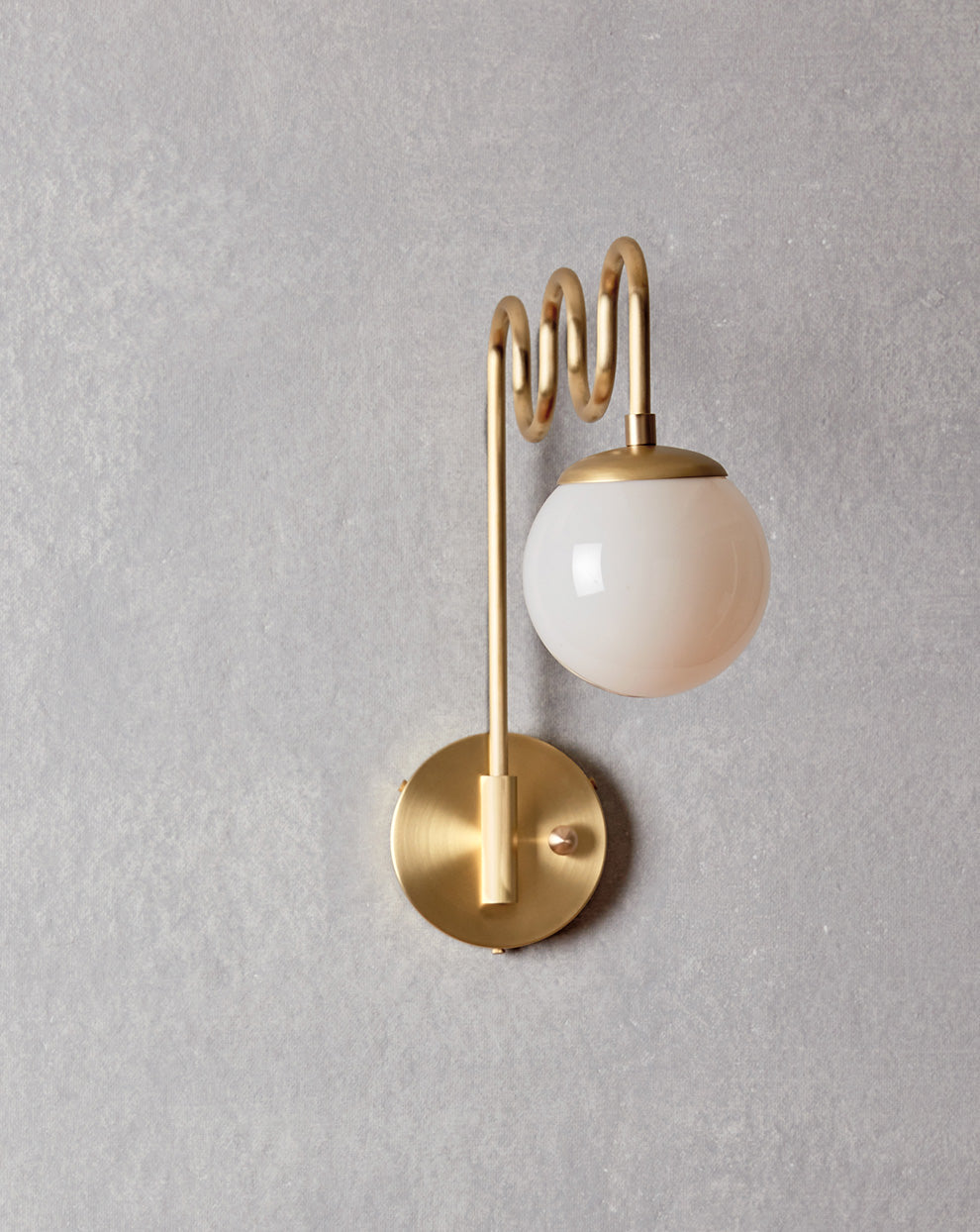 Cecil Wall Lamp – Undulating Bent Brass Arm & Swivel Glass Globe Sconce