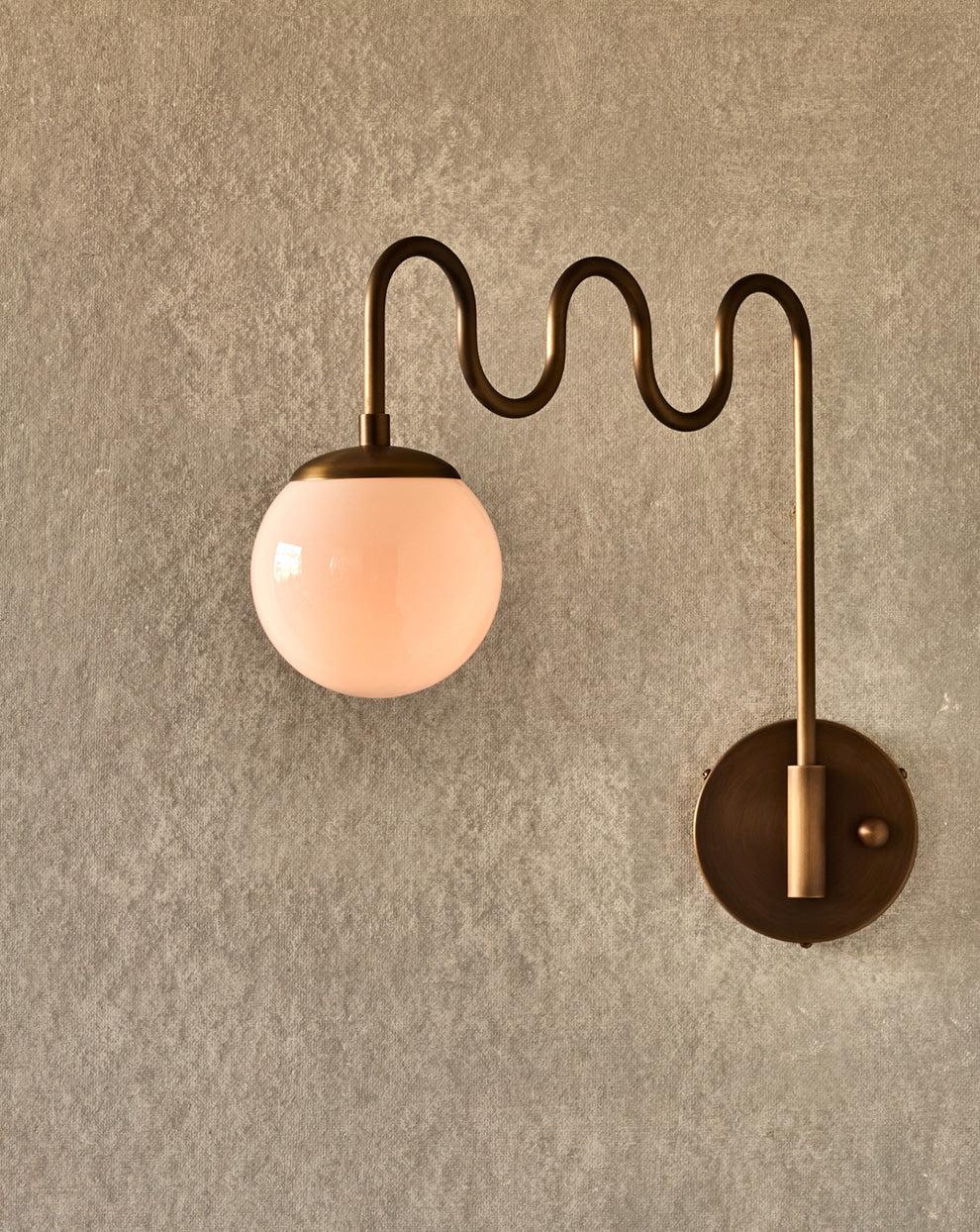 Cecil Wall Lamp – Undulating Bent Brass Arm & Swivel Glass Globe Sconce