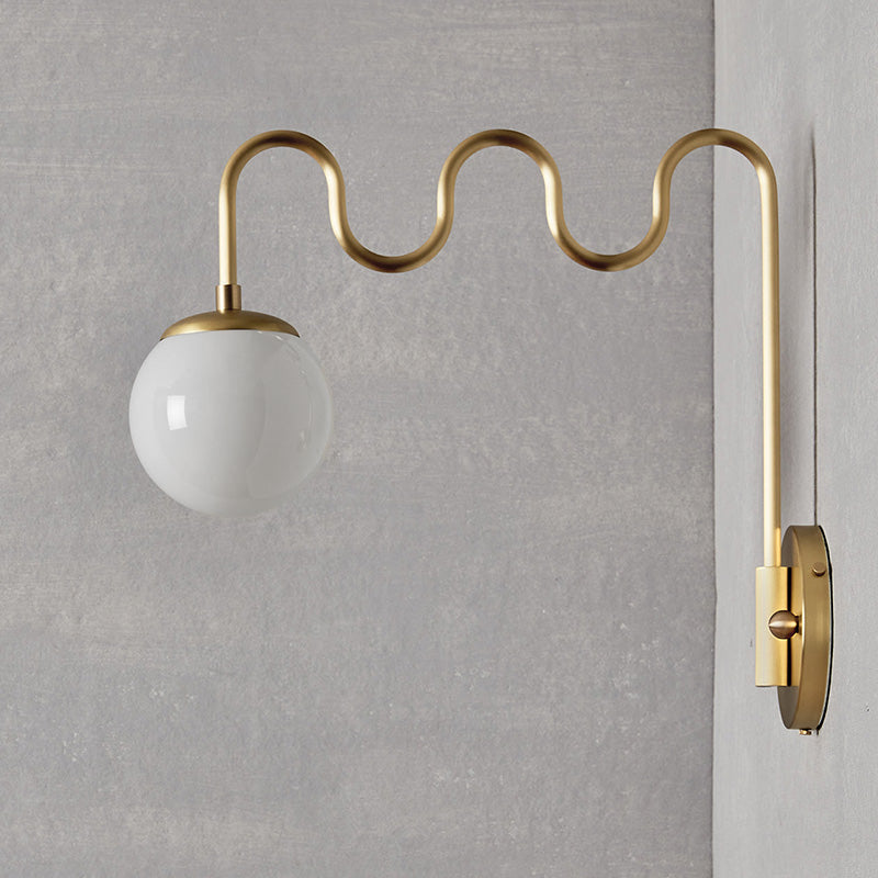Cecil Wall Lamp – Undulating Bent Brass Arm & Swivel Glass Globe Sconce