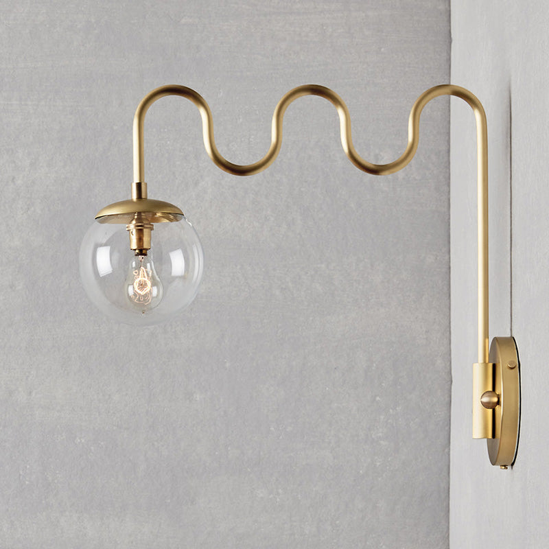 Cecil Wall Lamp – Undulating Bent Brass Arm & Swivel Glass Globe Sconce