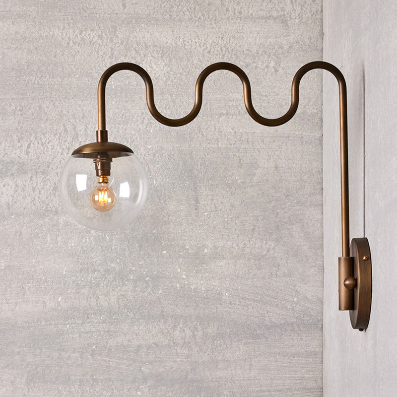 Cecil Wall Lamp – Undulating Bent Brass Arm & Swivel Glass Globe Sconce