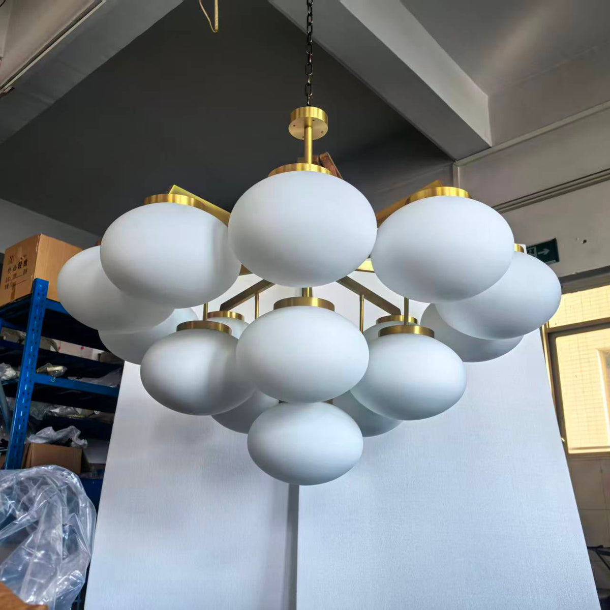 Cloudesley Chandelier – Machined Brass & Tiered White Glass Chandelier