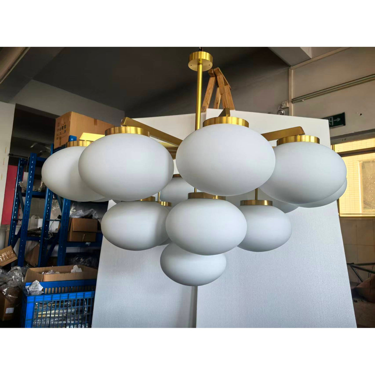 Cloudesley Chandelier – Machined Brass & Tiered White Glass Chandelier