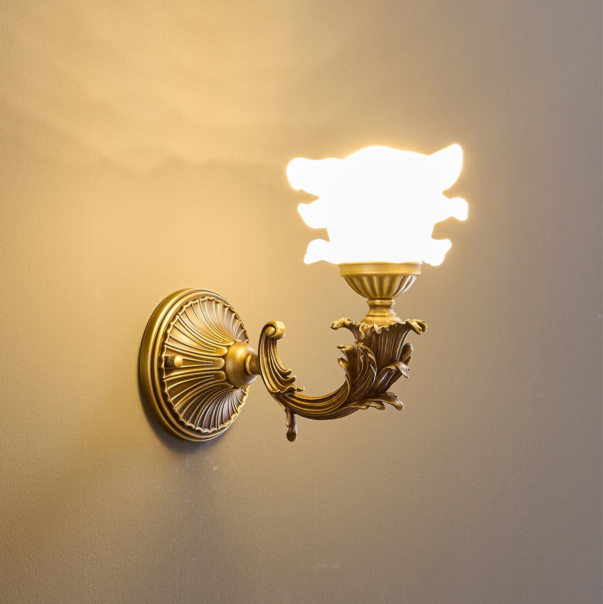 Darwin Wall Lamp – Antique Brass Curved Arm Sconce with Floral Glass Shade