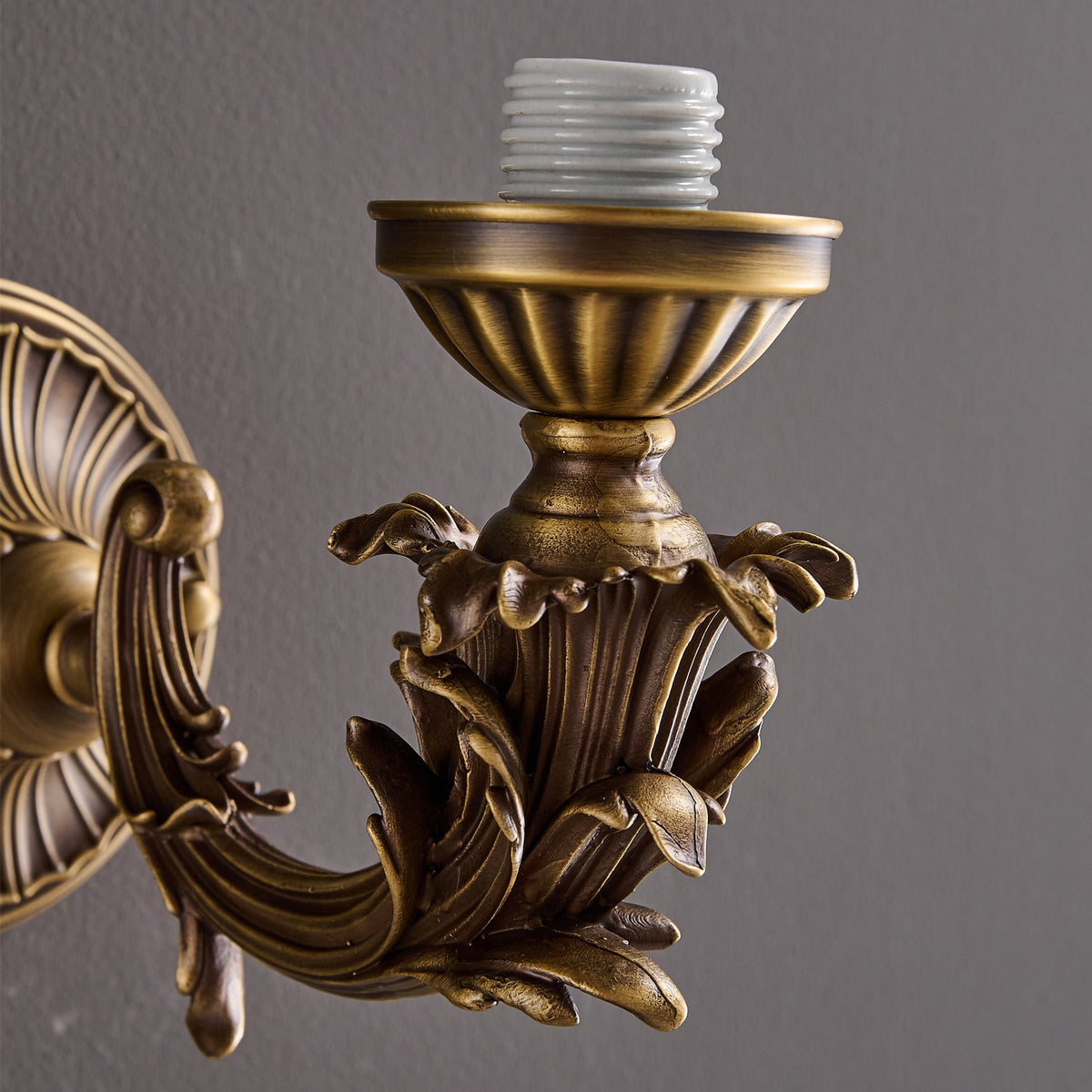 Darwin Wall Lamp – Antique Brass Curved Arm Sconce with Floral Glass Shade