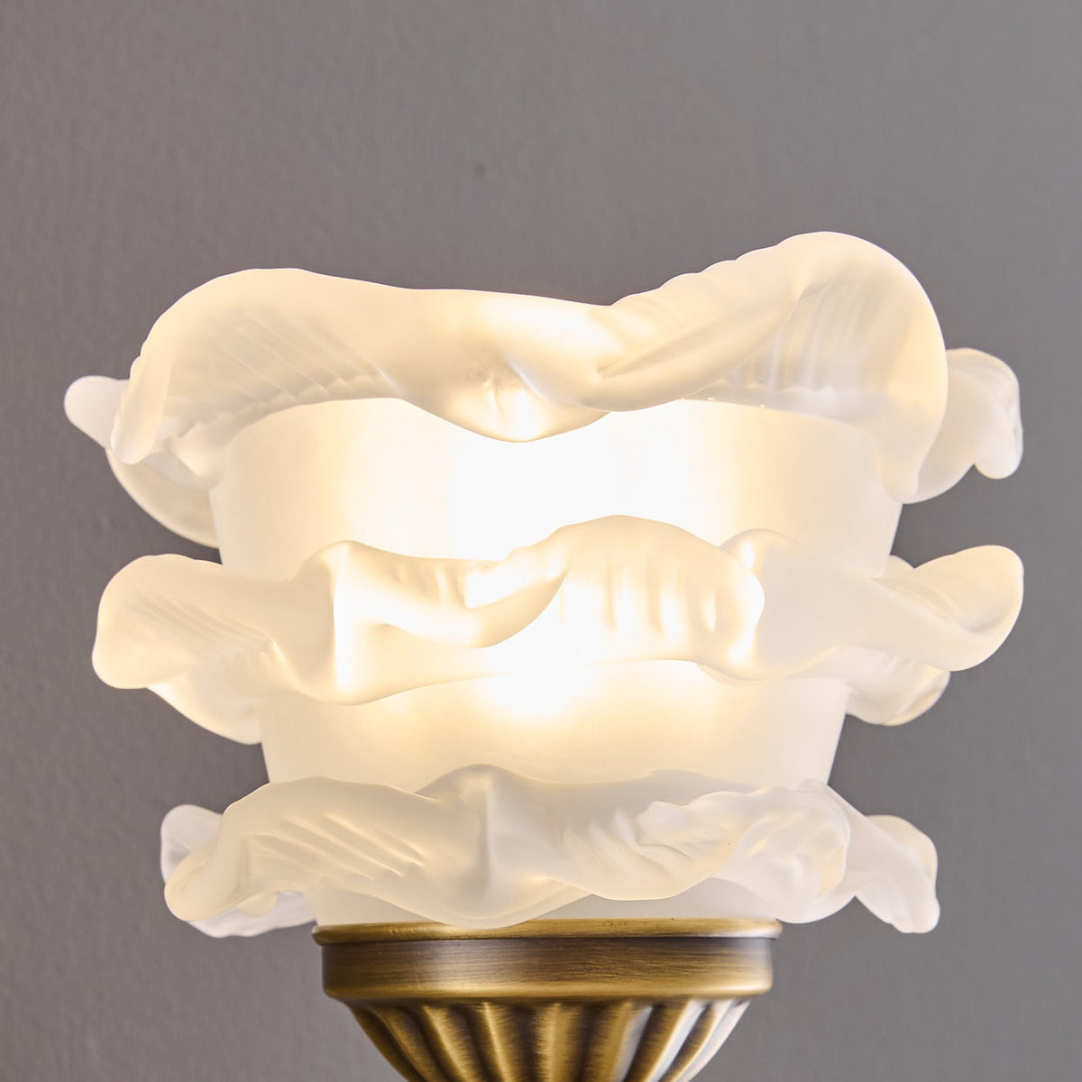 Darwin Wall Lamp – Antique Brass Curved Arm Sconce with Floral Glass Shade