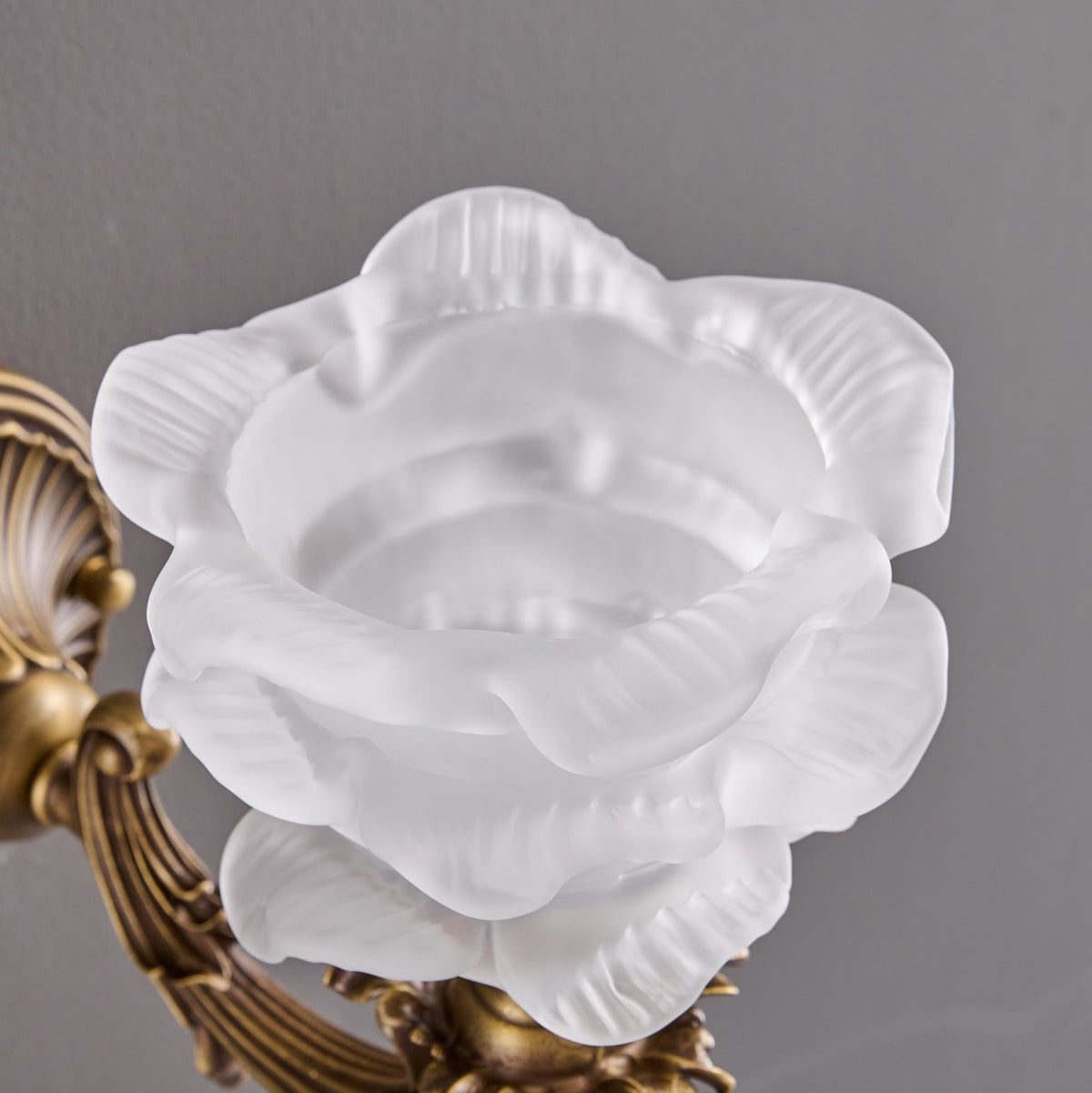 Darwin Wall Lamp – Antique Brass Curved Arm Sconce with Floral Glass Shade