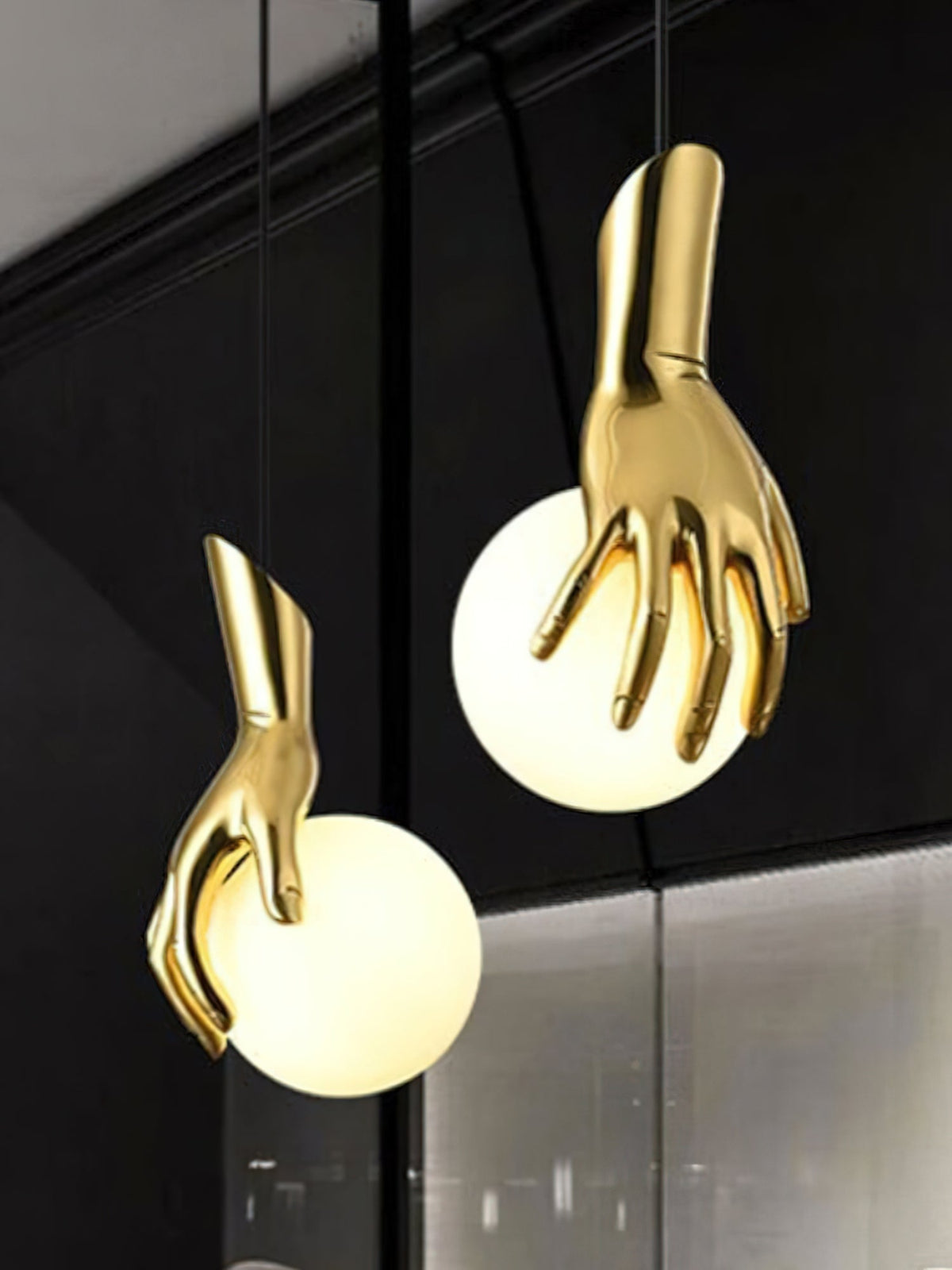Hand Holding Globe Pendant Light - Sculptural Brass Hand & White Glass Orb Pendant