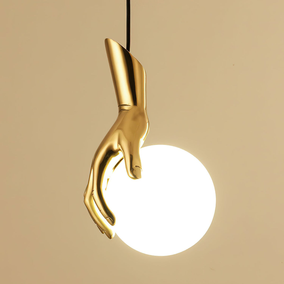 Hand Holding Globe Pendant Light - Sculptural Brass Hand & White Glass Orb Pendant