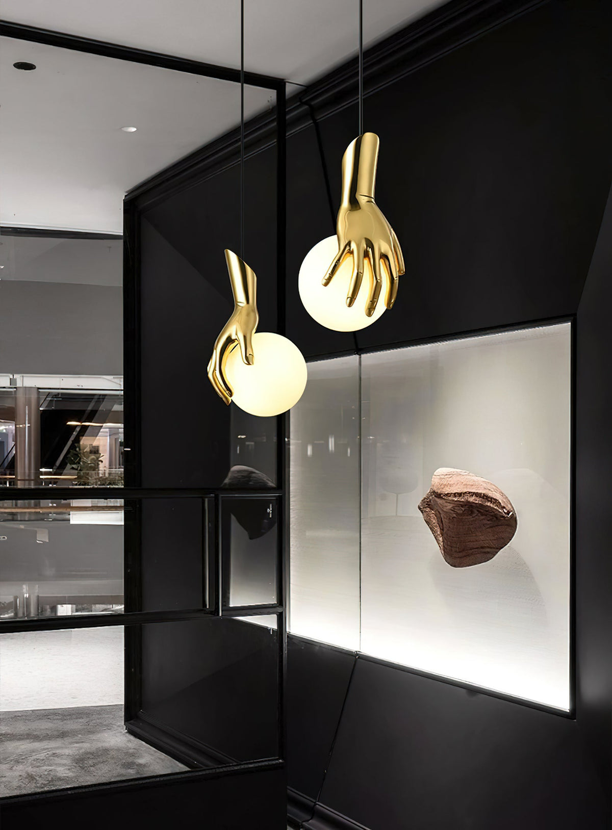 Hand Holding Globe Pendant Light - Sculptural Brass Hand & White Glass Orb Pendant