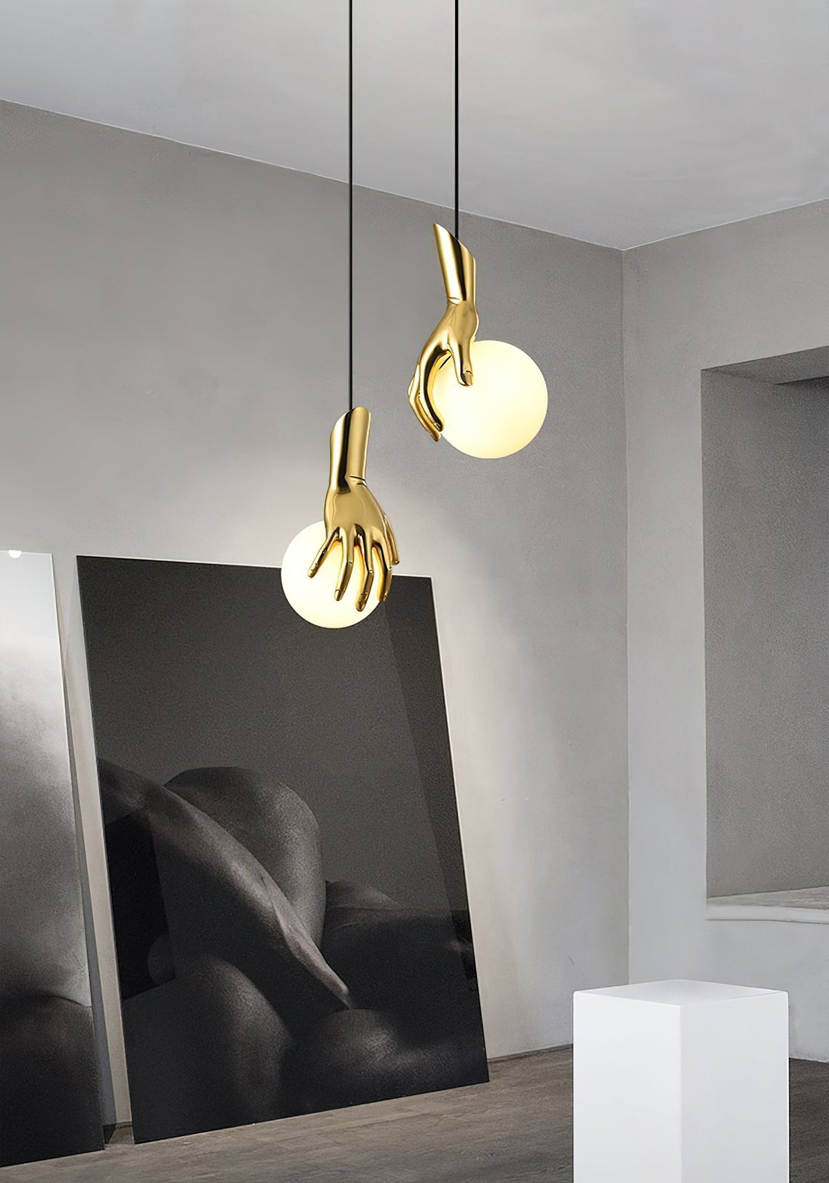 Hand Holding Globe Pendant Light - Sculptural Brass Hand & White Glass Orb Pendant