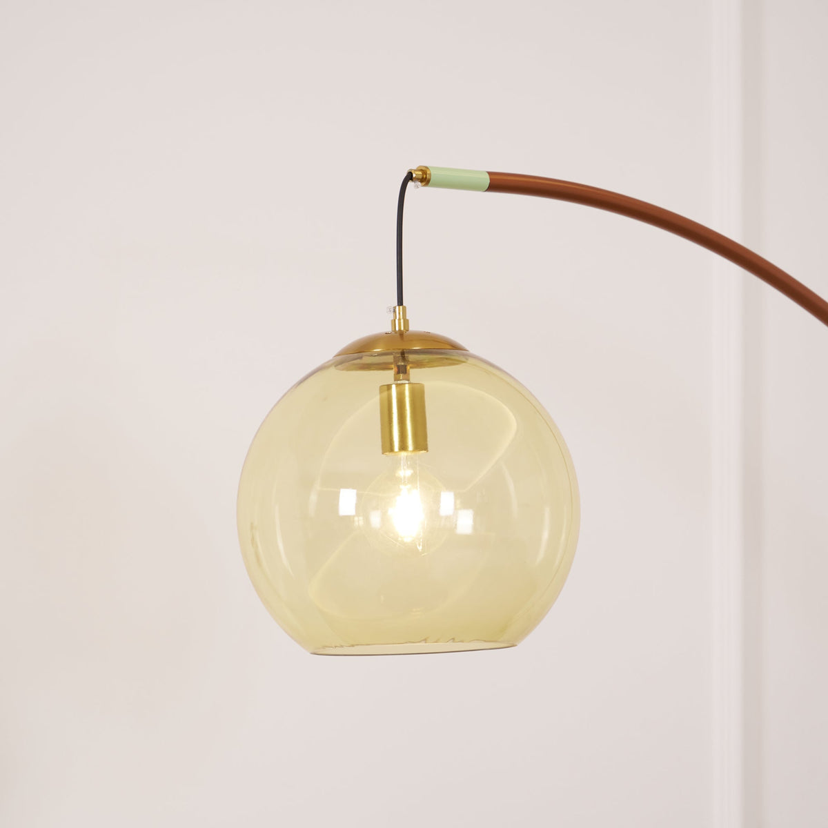 Joni Arc Floor Lamp - Soho House Inspired Green Metal & Amber Glass Sphere Arc Light