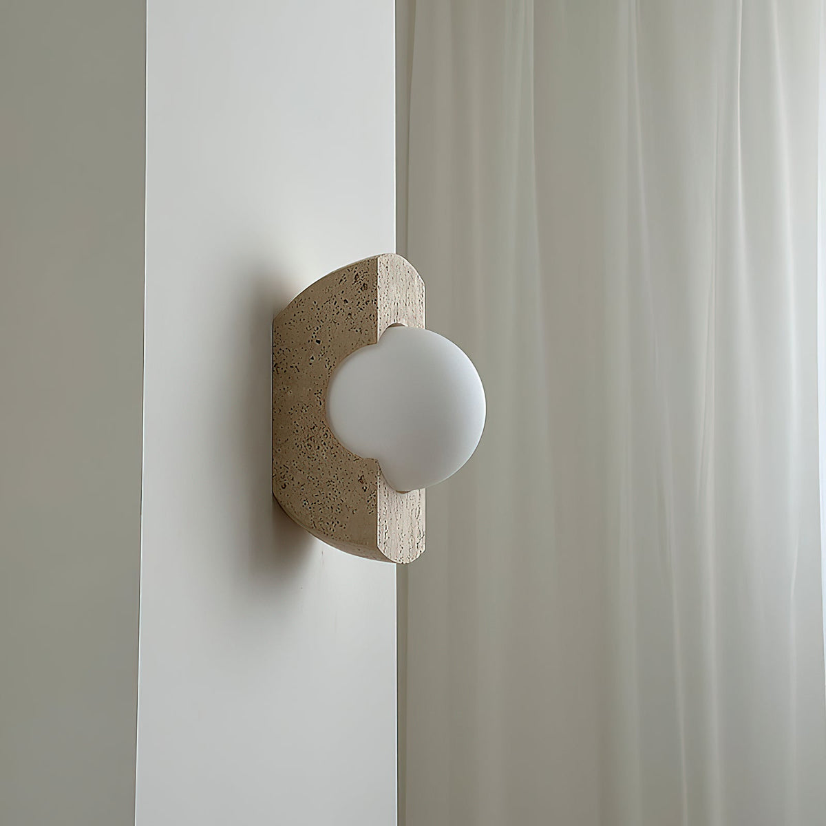 Neptune Travertine Wall Lamp - Natural Porous Stone & Opal Glass Globe Sconce