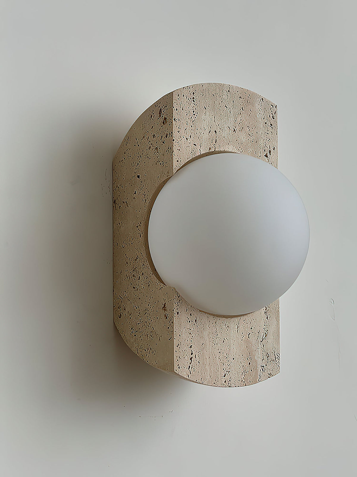 Neptune Travertine Wall Lamp - Natural Porous Stone & Opal Glass Globe Sconce