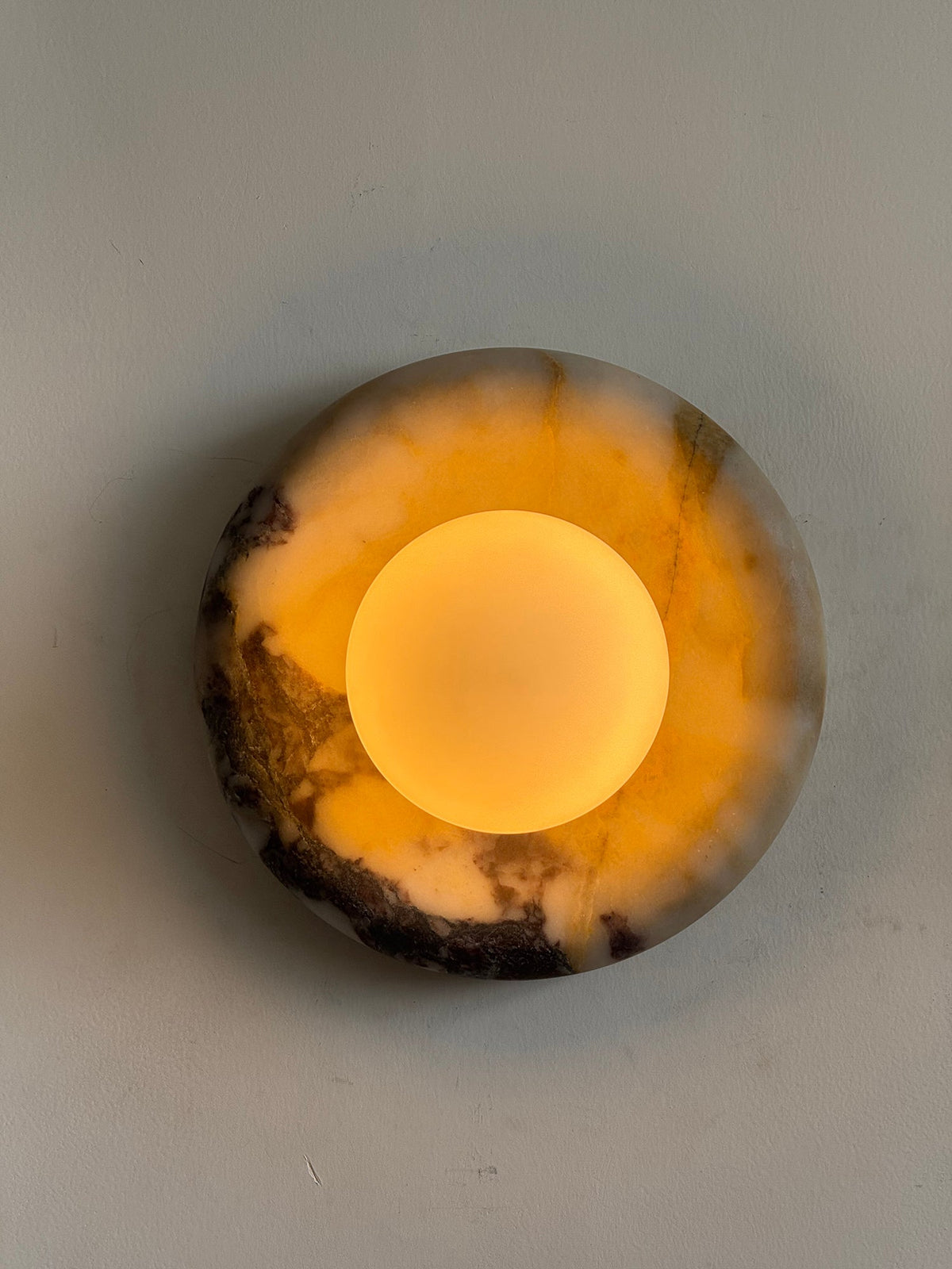 Orli Beige Marble Sconce - Curved Natural Cream Stone & Glass Globe Sconce