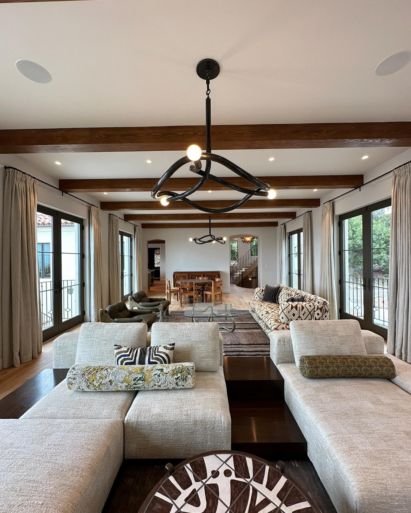 Tryst Chandelier - Interlocked Sculptural Brass Pendant Light | Modern Kinetic Balancing Chandelier
