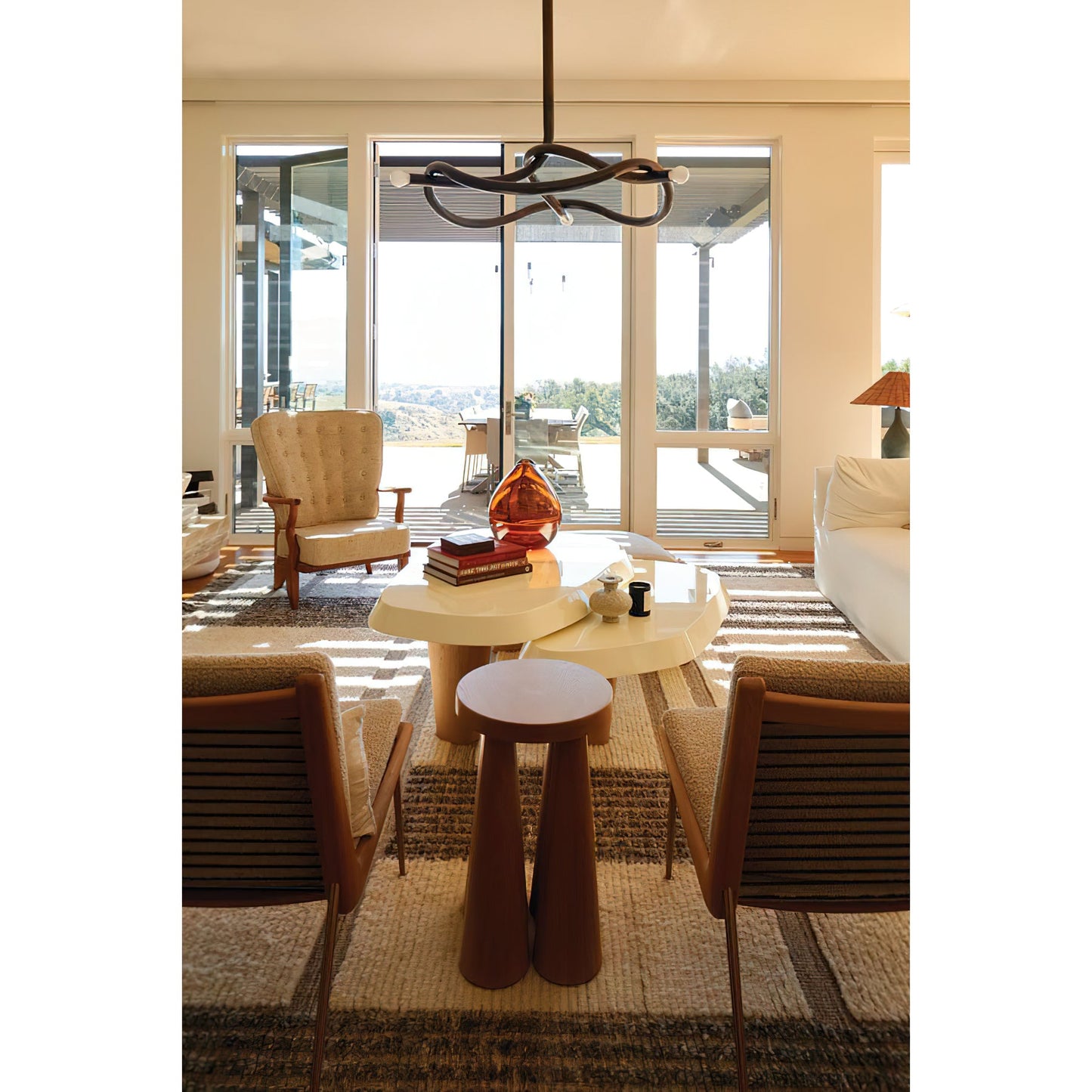 Tryst Chandelier - Interlocked Sculptural Brass Pendant Light | Modern Kinetic Balancing Chandelier