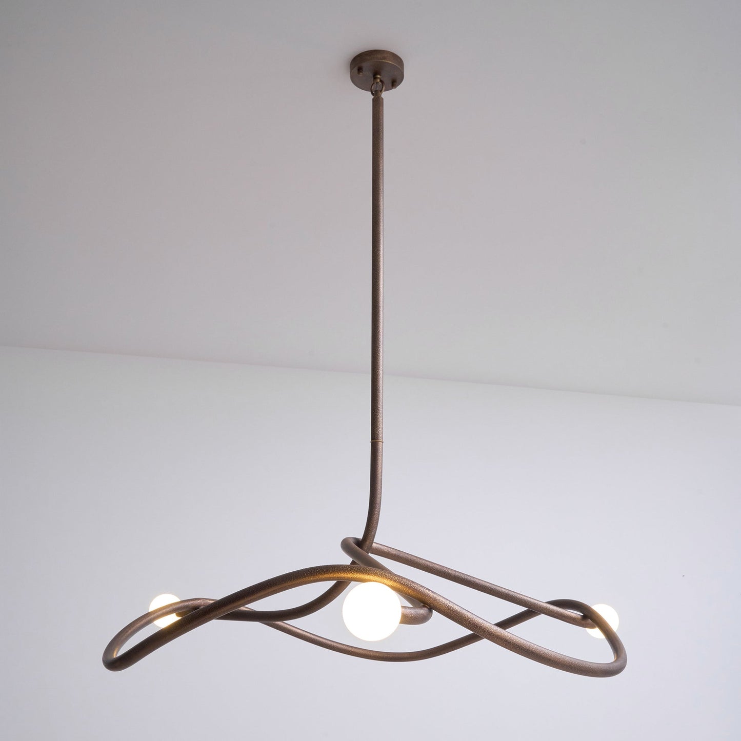 Tryst Chandelier - Interlocked Sculptural Brass Pendant Light | Modern Kinetic Balancing Chandelier