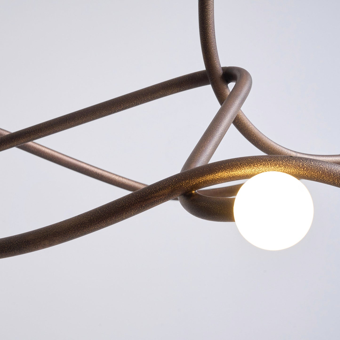 Tryst Chandelier - Interlocked Sculptural Brass Pendant Light | Modern Kinetic Balancing Chandelier