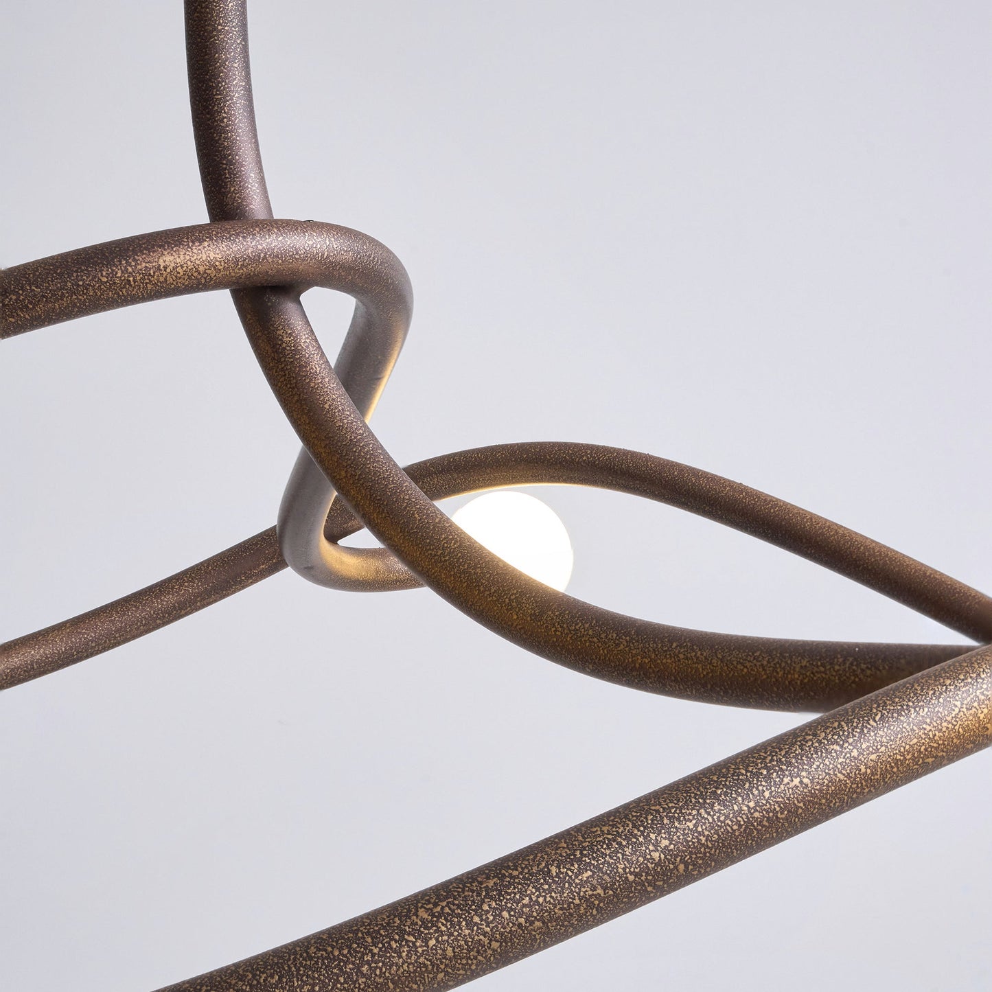 Tryst Chandelier - Interlocked Sculptural Brass Pendant Light | Modern Kinetic Balancing Chandelier